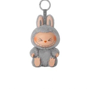 Gray Plush Keychain by The Monsters